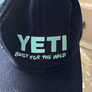 YETI navy blue  Hat with Teal Logo